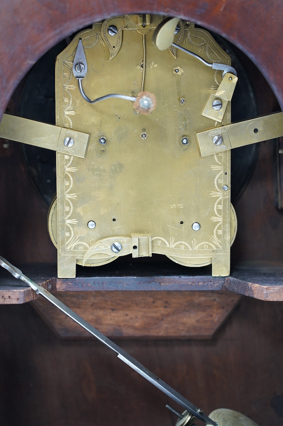 An early 19th century brass inlaid mahogany lancet shaped mantel clock by G. Willson of London, with pendulum and door-key, no winding key, 45cm. Condition - fair to good, not tested as working